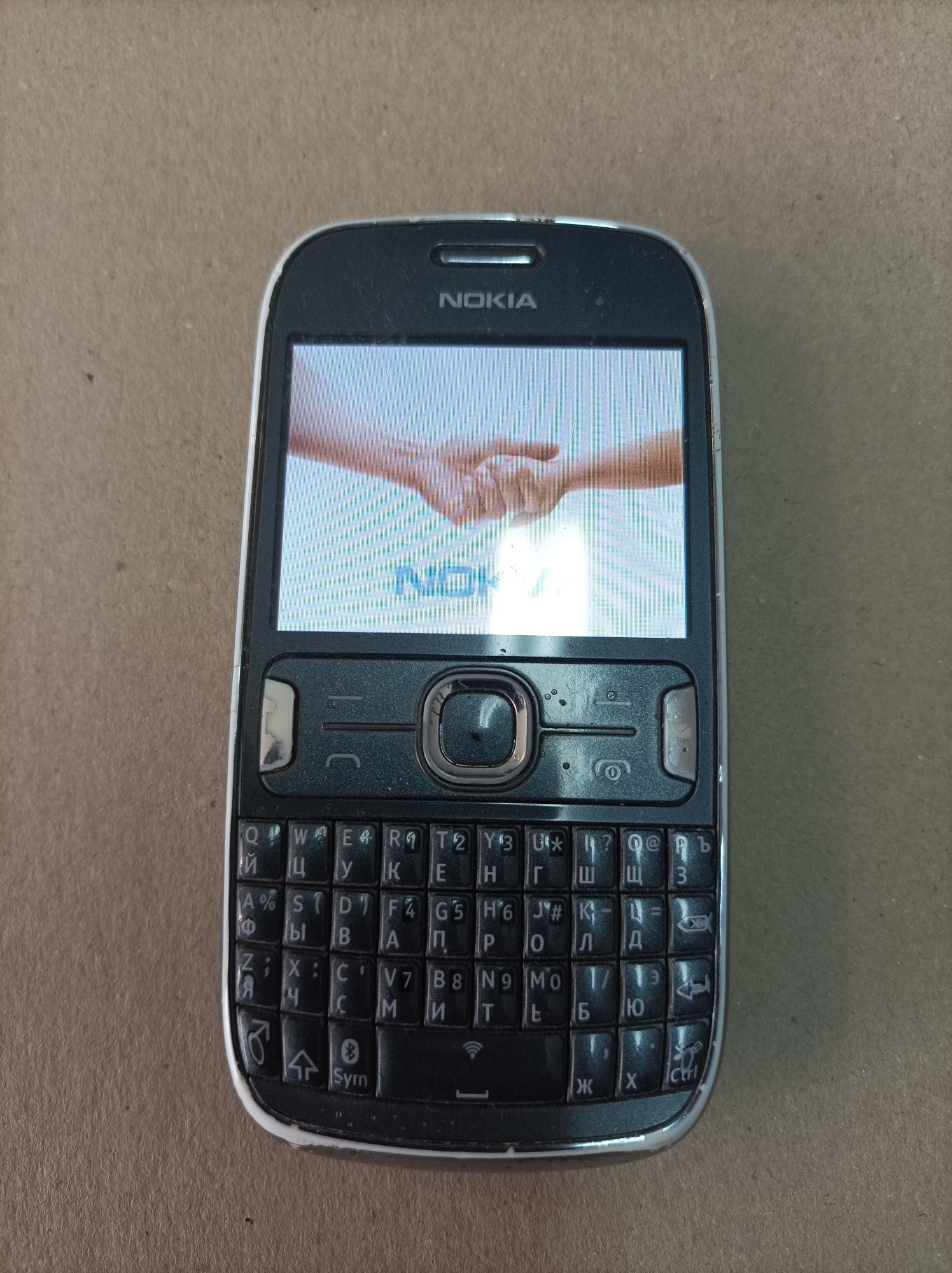 Телефон Nokia Asha 302