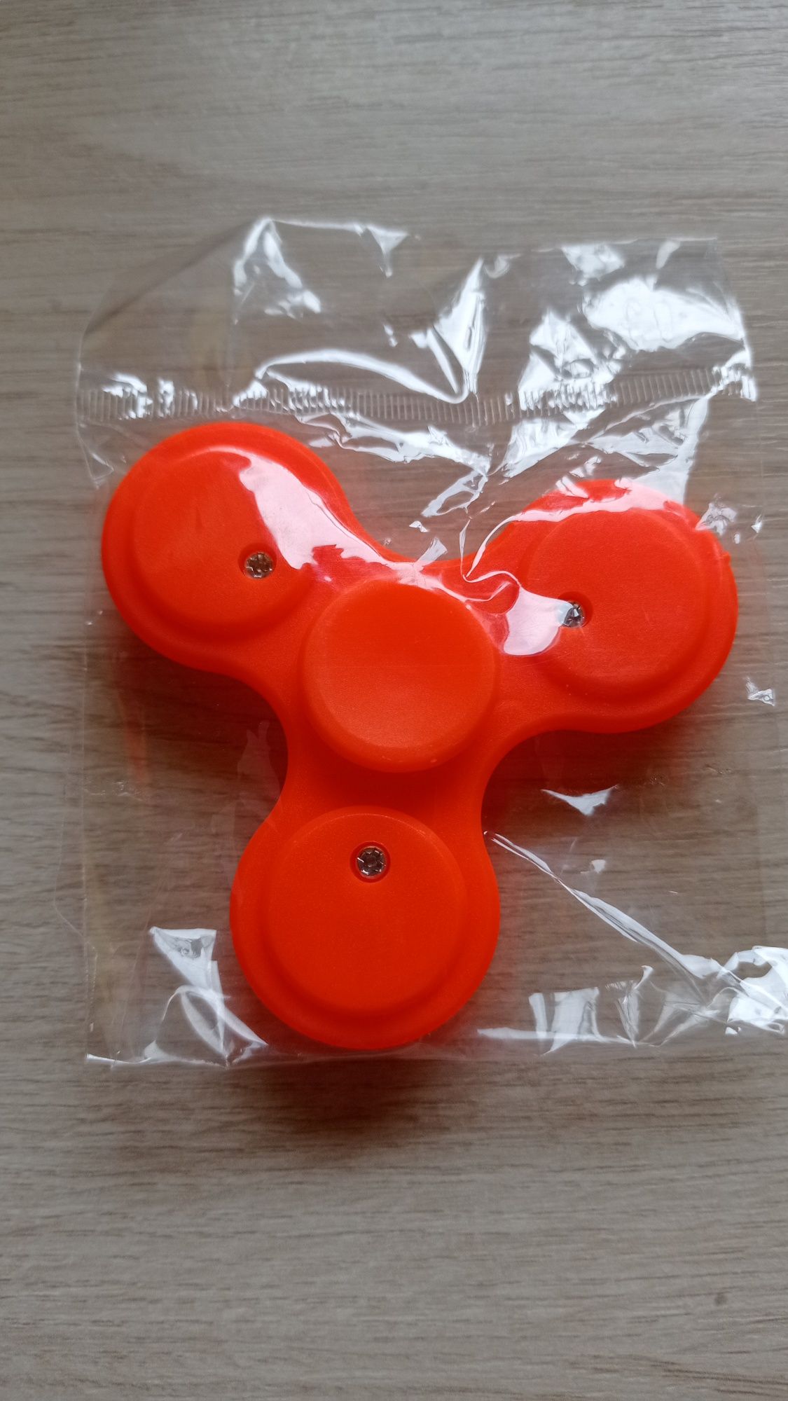 Fidget spinner spiner - nowy w folii, nieużywany - kol.jaskrawy orange