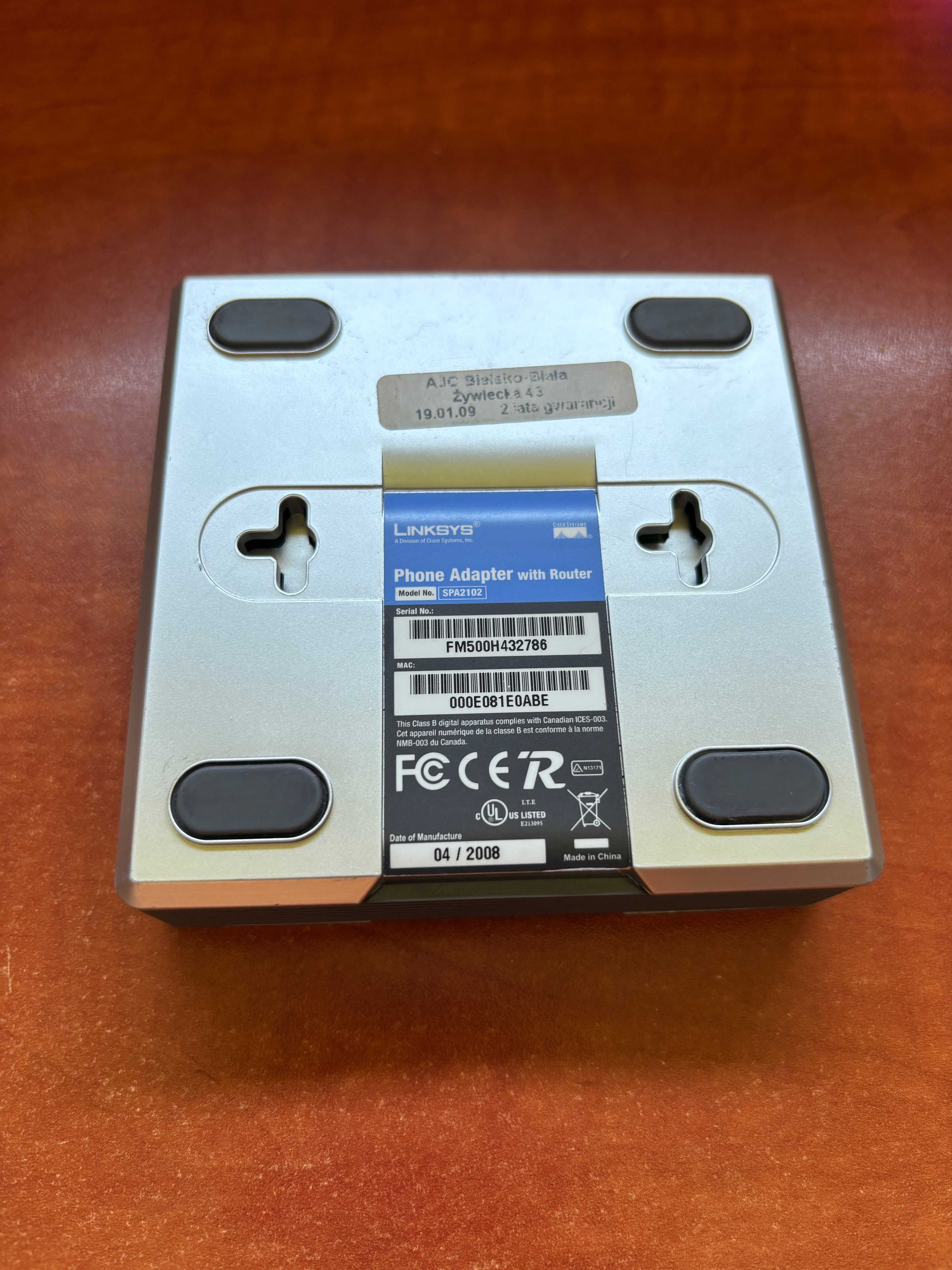 Linksys Phone adapter with router Model SPA2012