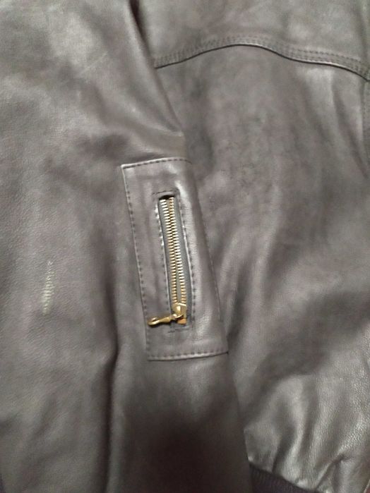 Blusão da marca Taurus em pele