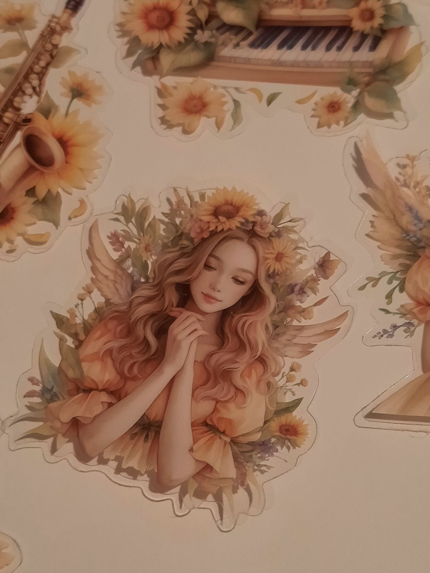 15 stickers, anjos e instrumentos musicais com girassóis. Scrapbooking