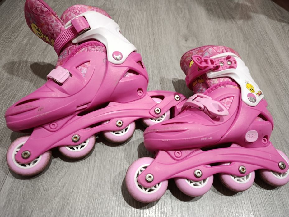 Patins em linha rosa