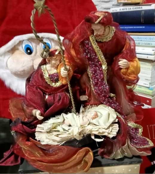 presépio de natal em tecido de loja gato preto