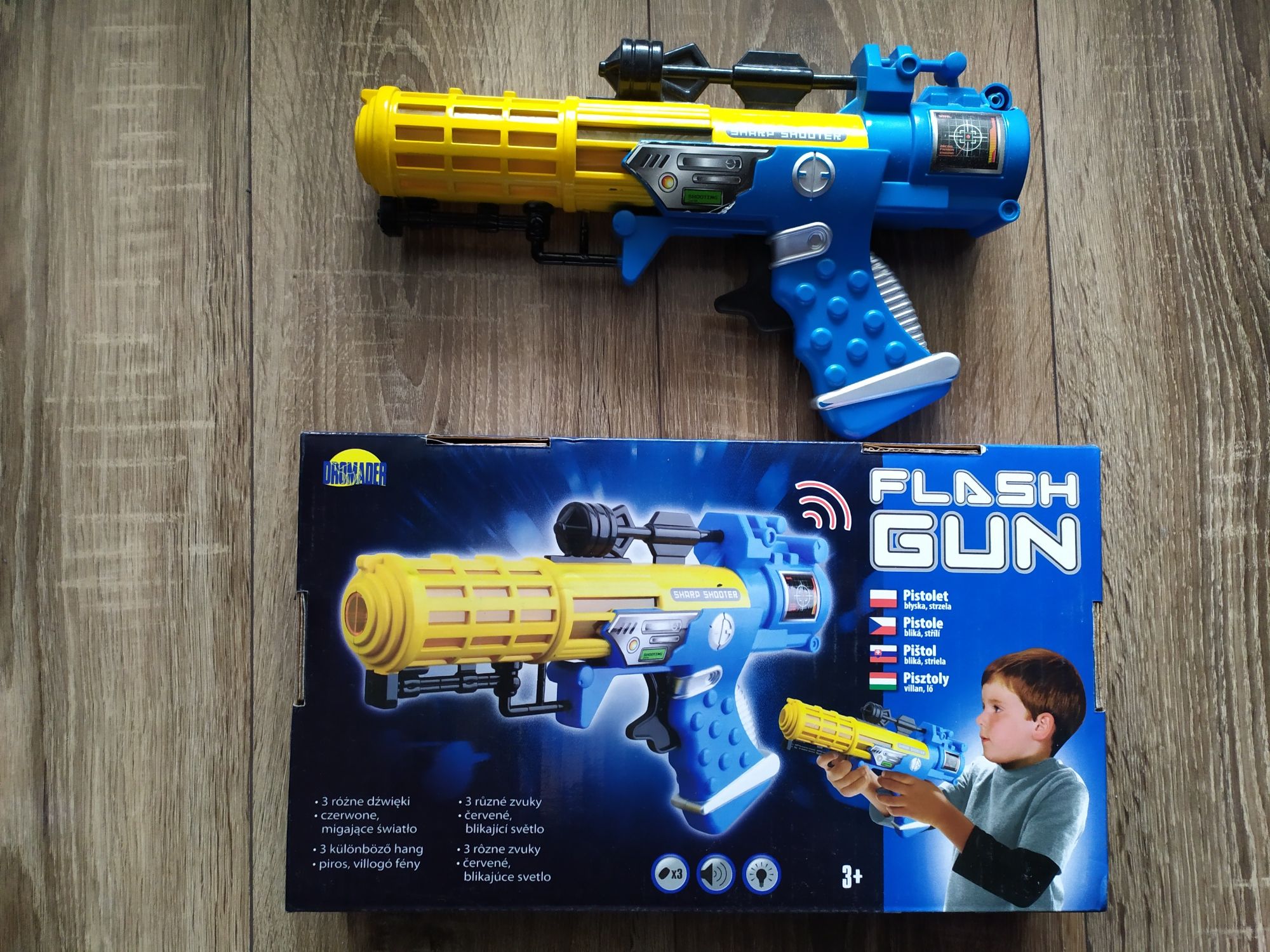 Pistolet plastikowy Flash Gun zabawka 3+ błyska strzela