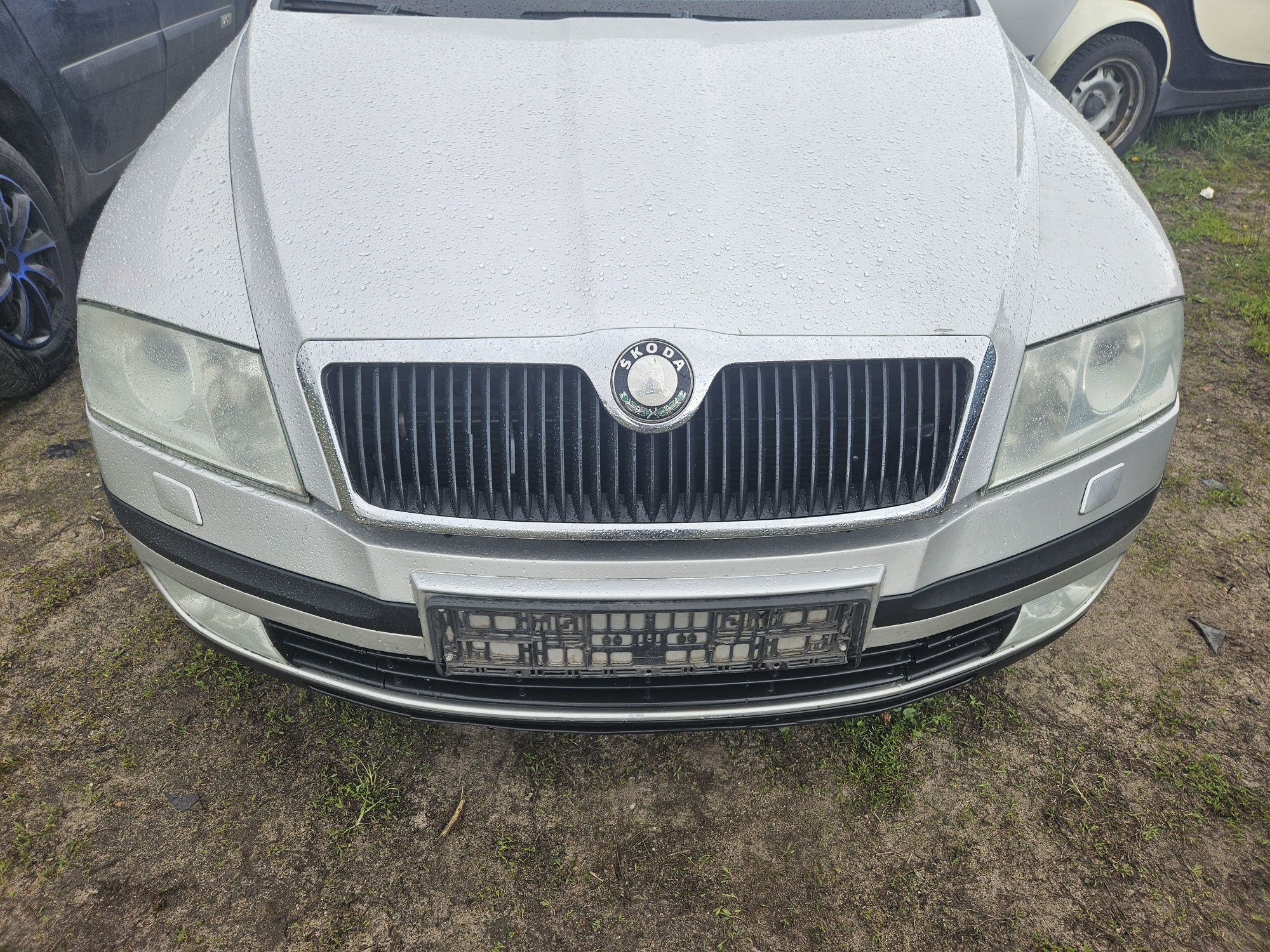 Skoda Octavia 2 zderzak maska lampa blotnik drzwi klapa koła 9102