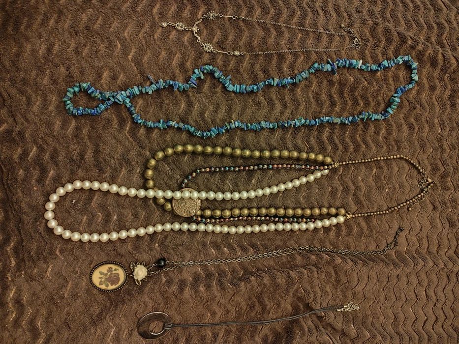 Saco de colares e fios