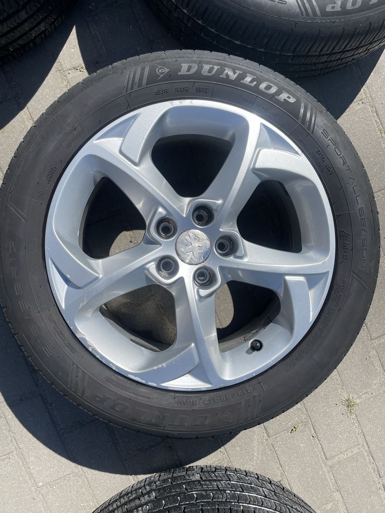 Alufelgi PEUGEOT 5x108 7J ET46 z oponami DUNLOP