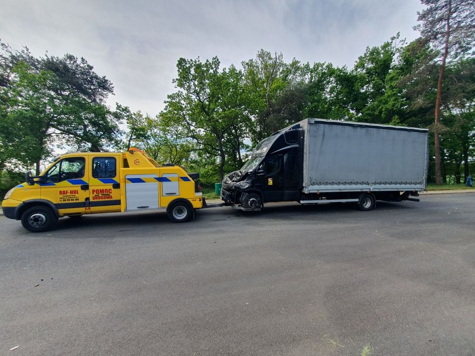 Transport pomoc drogowa laweta bus holholowanie
