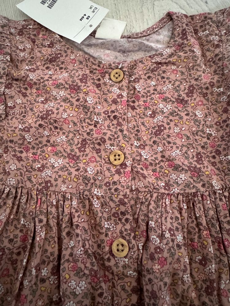 Nowa wzorzysta sukienka w kwiatki z falbankami H&M