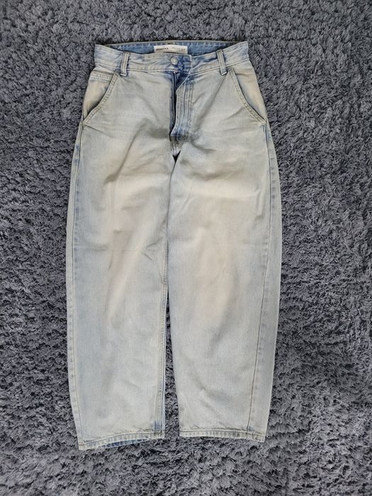 Calça jeans com lavagem clara