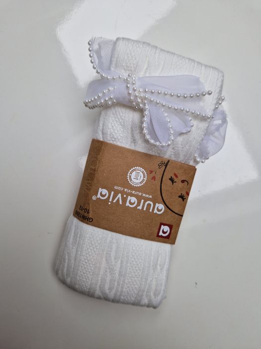 Rajstopy dziewczęce czarne z kokardką z perełkami 7-9 lat 122-128 aura