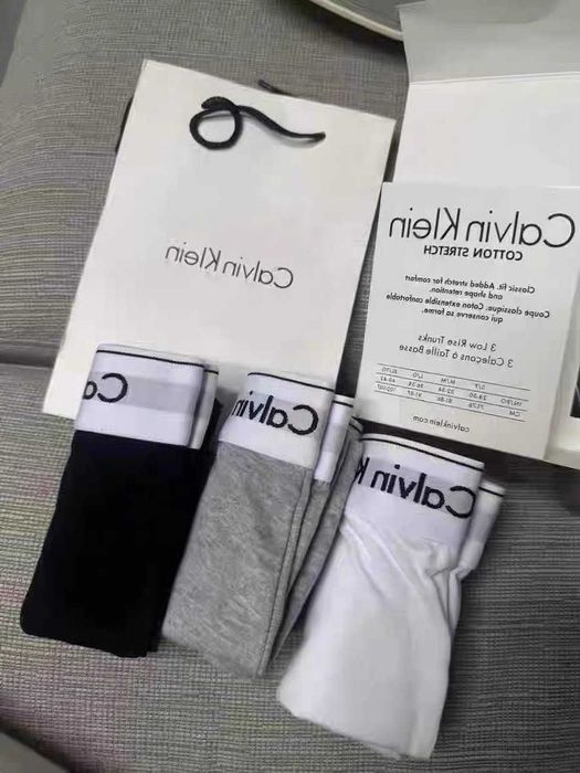 Bokserki bawełniane Calvin Klein–zestaw trzechpar:czarne,białe i szare