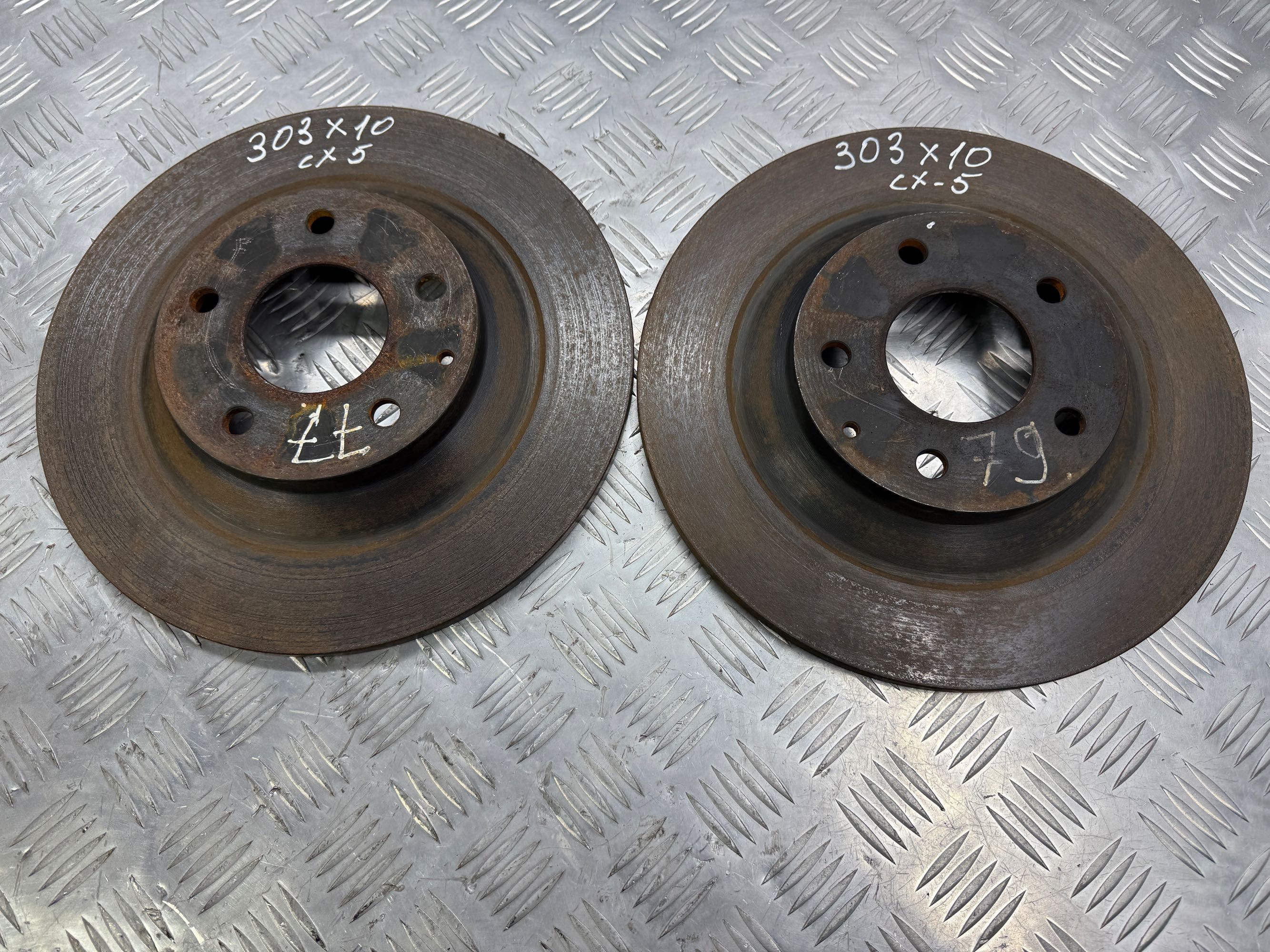 Диск тормозной задний Диски mazda cx-5 12-  303x10