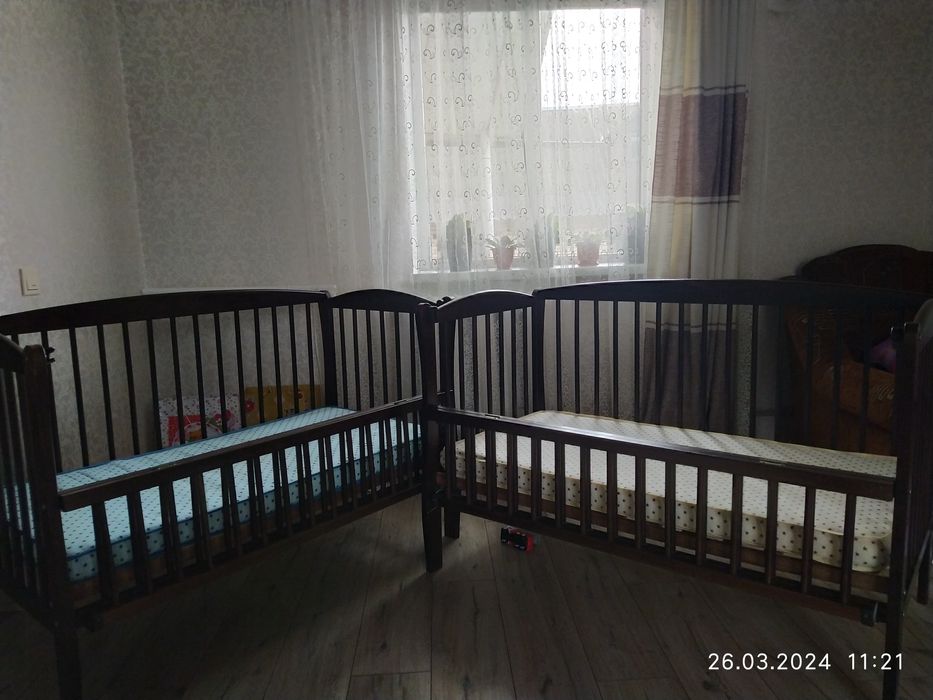 Дитячі ліжечка з матрацами