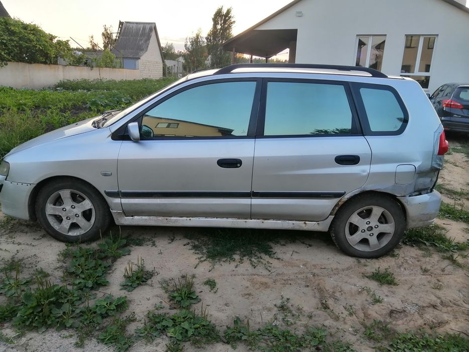 Мицубиси спейс стар 2002