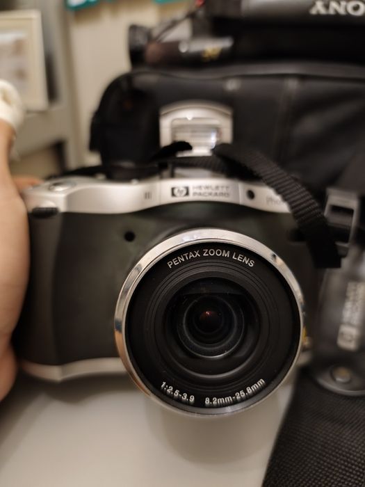 Máquina fotográfica HP Photosmart 912, com flash Toshiba 316