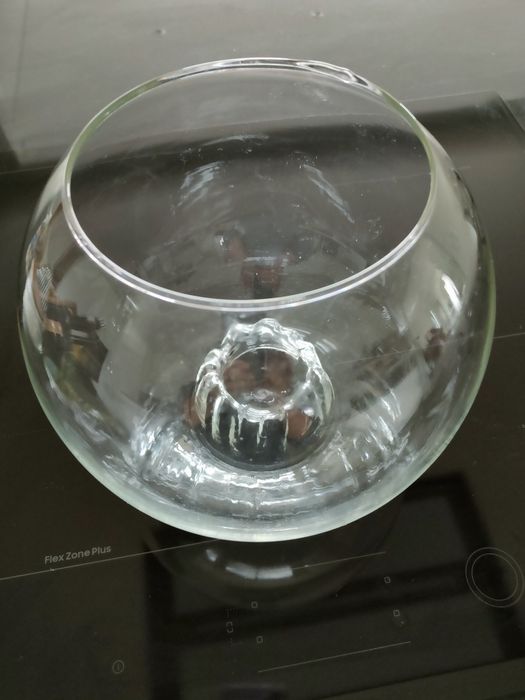 Conjunto de porta velas e aquário.