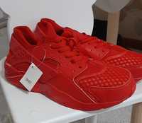 Червоні кросівки Nike air huarache