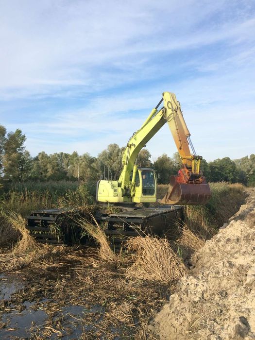 Аренда плавающего экскаватора земснаряда драглайна болотного экскавато