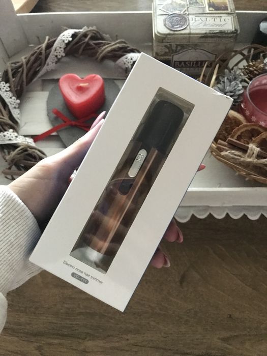 Електричний тример для волосся в носі