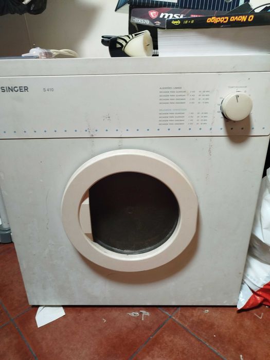 Máquina de secar roupa