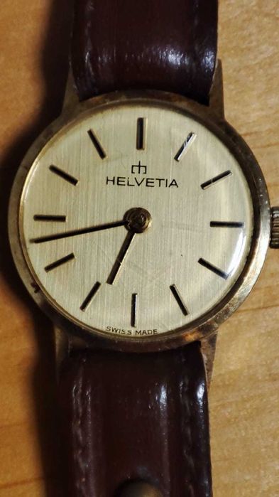 Złoty zegarek damski, szwajcarski Helvetia. Działający, stan bdb.