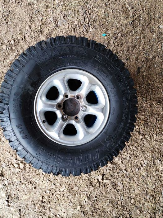 Alufelga 31 X 10.5 R 15 od Pajero II z mocowaniem na klapie