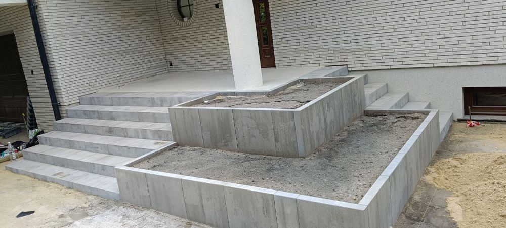 Układanie kostki brukowej brukarstwo odwodnienia równanie terenu