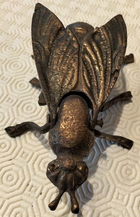 Mosca em  bronze