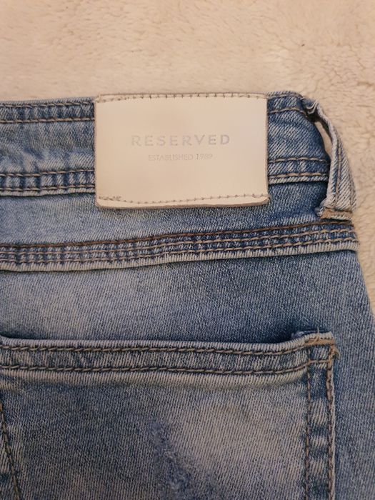Spodnie dżinsy przetarcia Reserved W27 L32