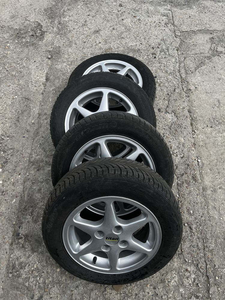 Felgi aluminiowe 175/65 r14 na zimowych oponach