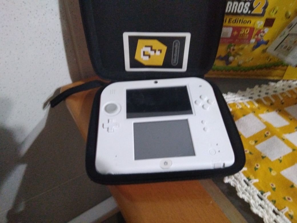 Nintendo com capa e jogo super mario