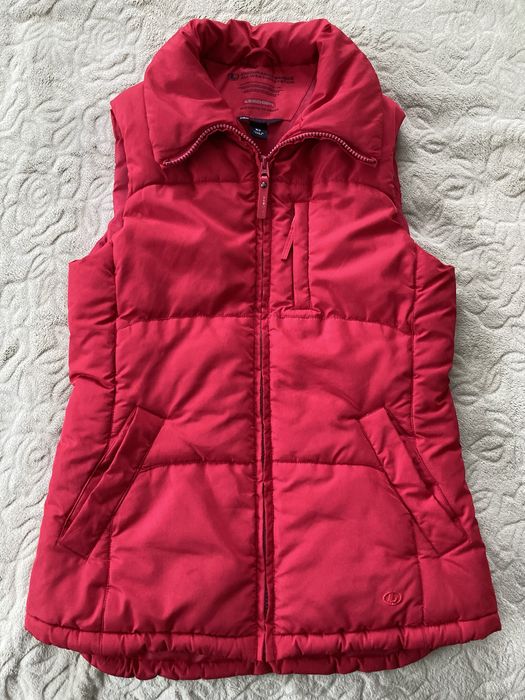 Жіноча жилетка, безрукавка