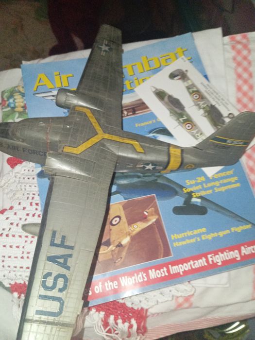 Revista avião e postal da Parker