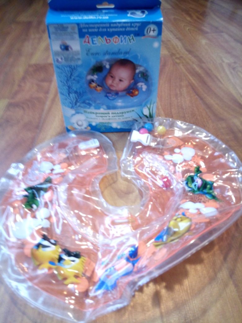 продам дитячі іграшки розвиваючі та круг для плавання