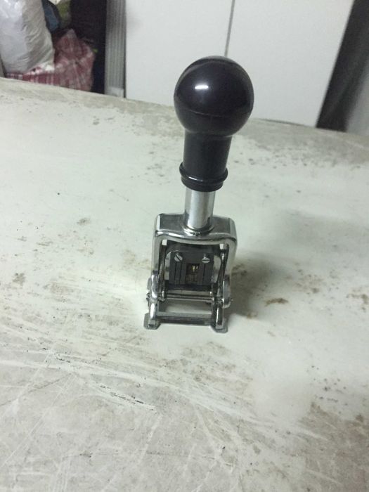 Datador antigo em bom estado