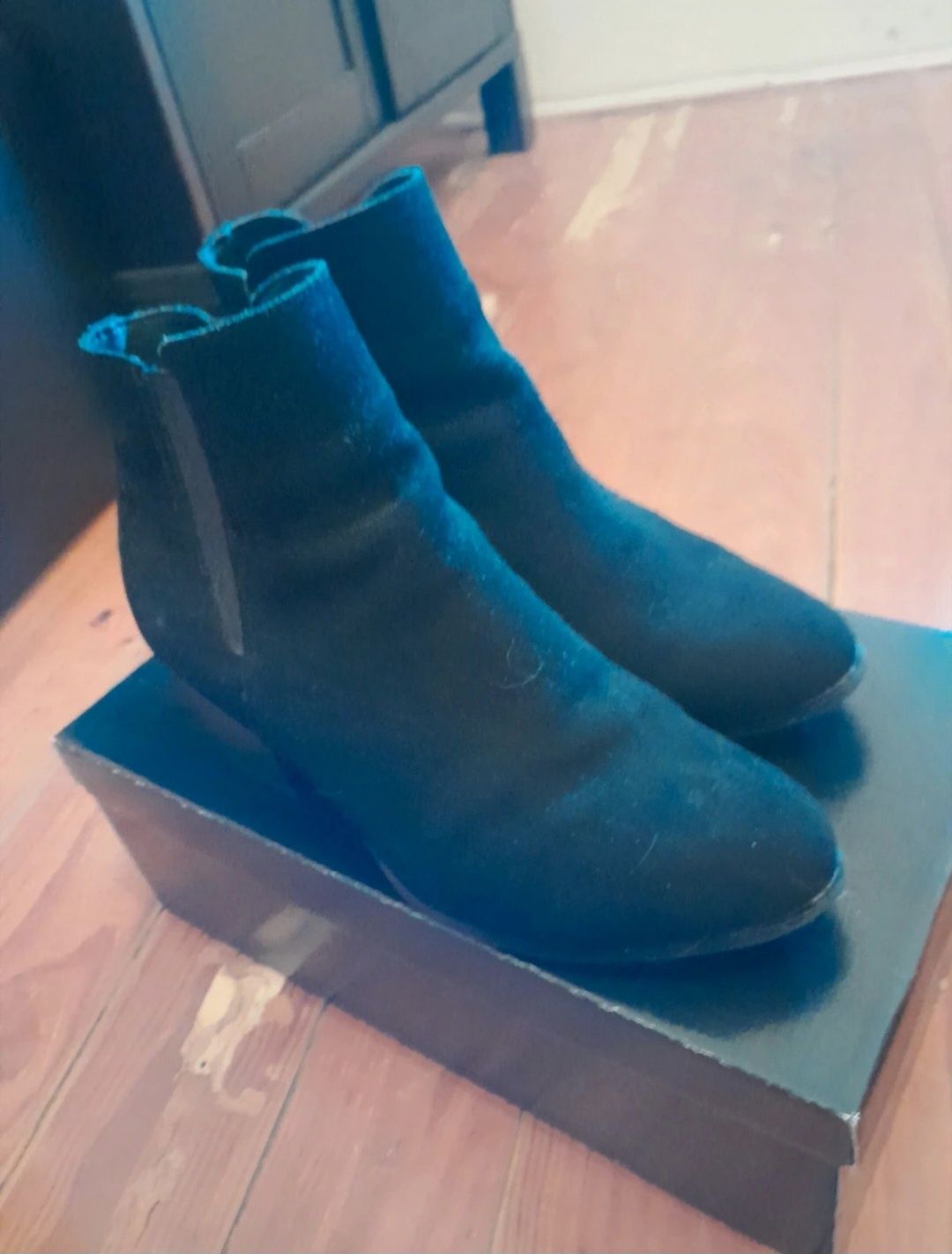 Botas pretas com tacão