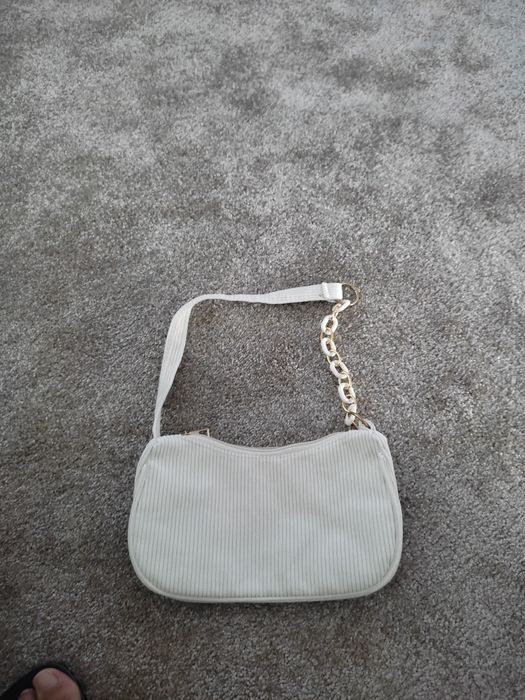 Pochete mala pequena branca e dourada