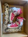 Patins em linha rosa