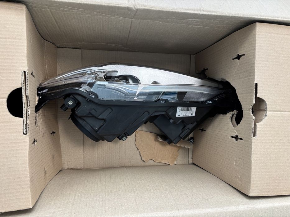 Farol Jaguar XJ (X351) - esquerdo