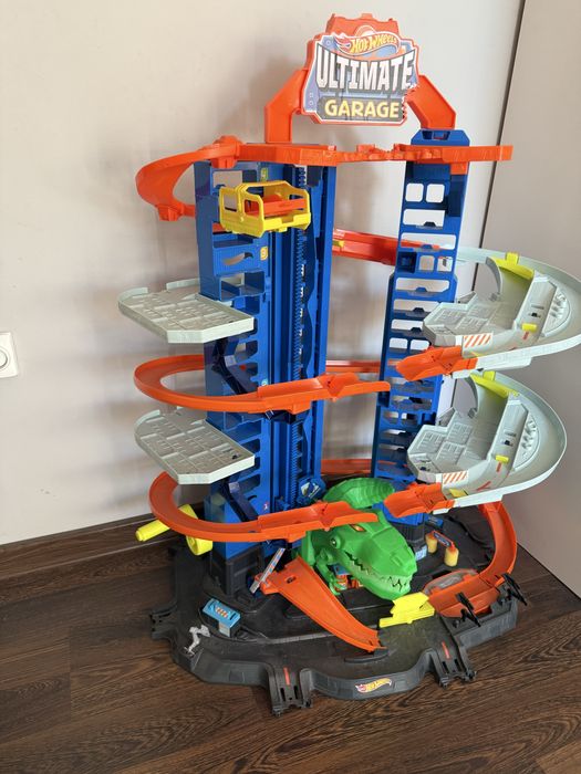 ZESTAW Mattel Hot Wheels City GJL14 Mega Garaż Atak Dinozaura T-Rex