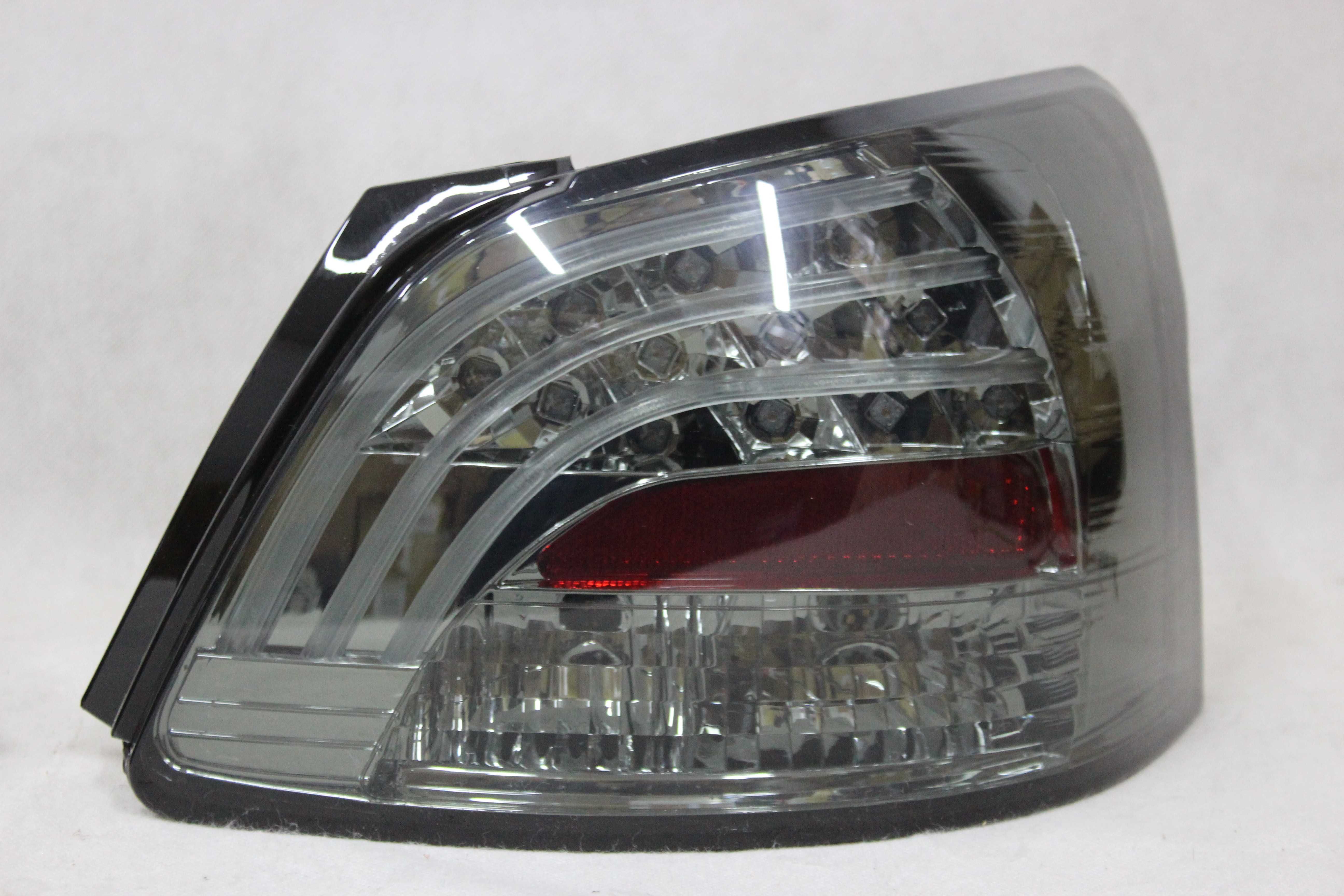 Lampy światła tył tylne TOYOTA Yaris II Vios Belta XP90 08-11 LED NOWE