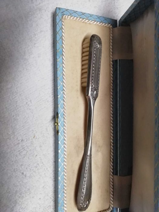 Escova de dentes em prata