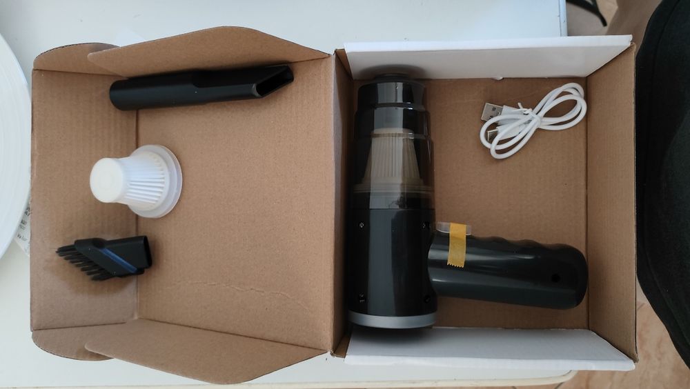 Mini aspirador portátil