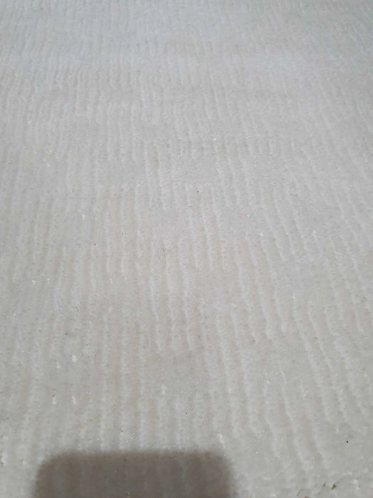 Kremowy dywanik 148 x 100 cm