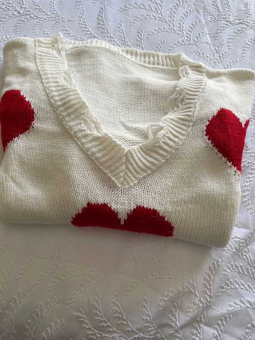 Camisolas e porta moedas