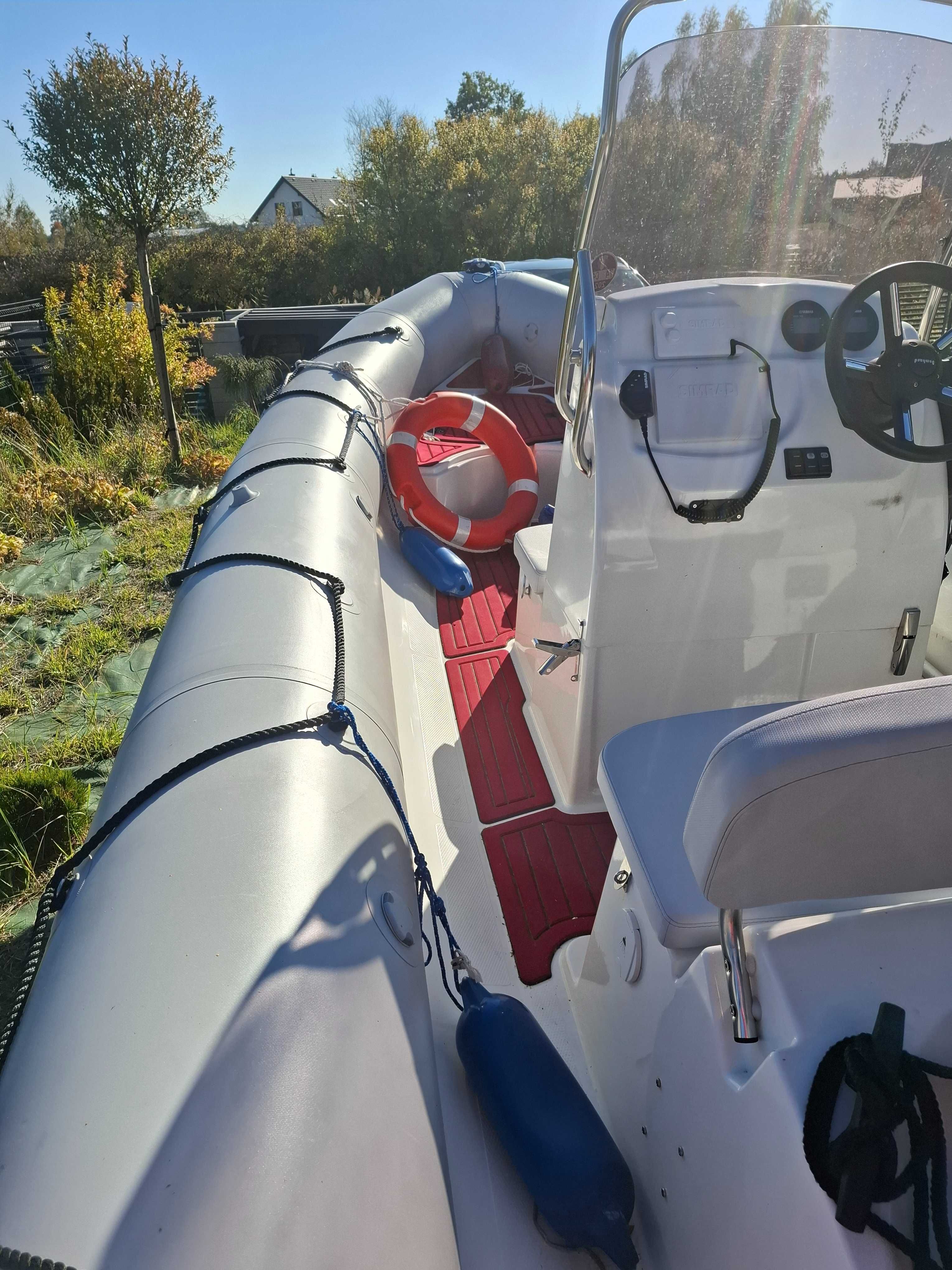 Sprzedam łódz motorową RIB sunrider 550 wraz z przyczepą .