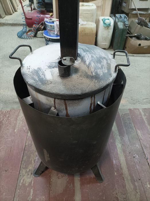 Продам буржуйку верхнього горіння та труби до неї.