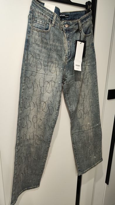 Szerokie spodnie szwedy z cekinami M. Sara