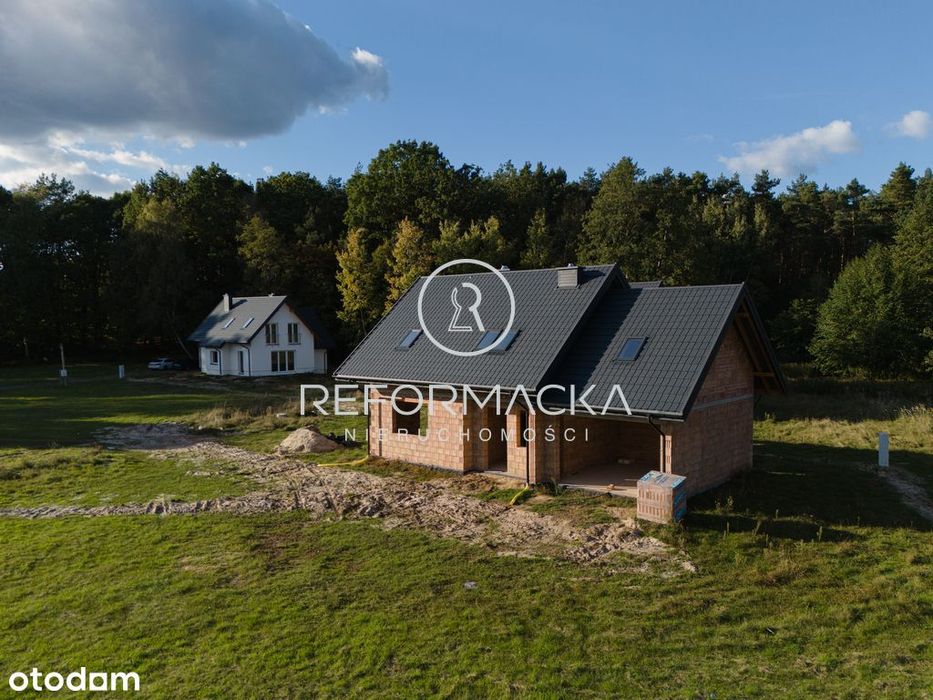 Dom pod lasem, garaż 2-stanowiskowy, 10 ar działki